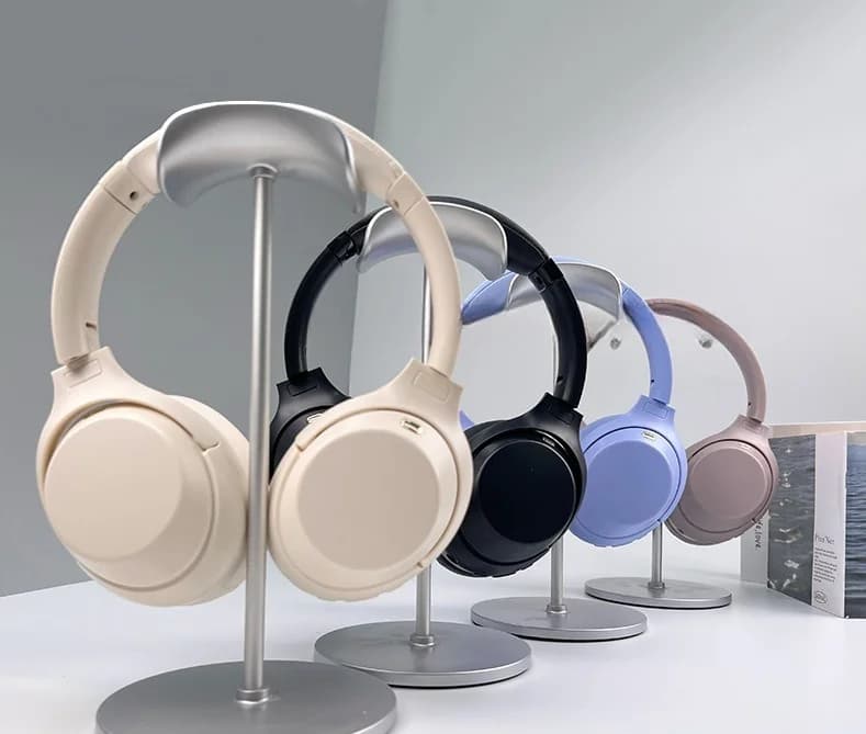 Antausinės belaidės Bluetooth ausinės su aktyviu triukšmo slopinimu